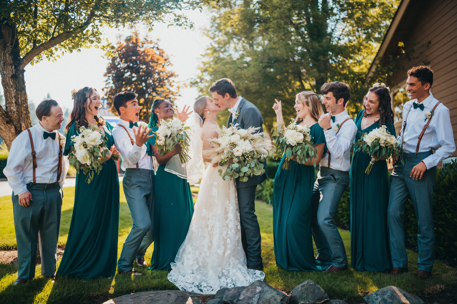 Matthew and Kaitlynn at their wedding, surrounded by their wedding party